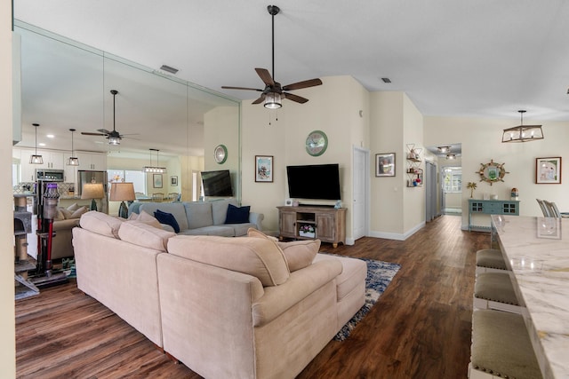 7884 Travlers Tree Dr, Boca Raton, FL 33433 - living area with a ceiling fan, dark wood-type flooring, baseboards, and high vaulted ceiling