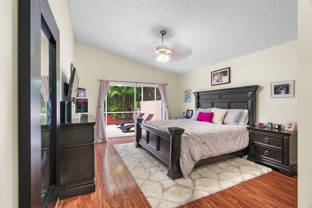 7884 Travlers Tree Dr, Boca Raton, FL 33433 - bedroom featuring vaulted ceiling, wood finished floors, a textured ceiling, and a ceiling fan