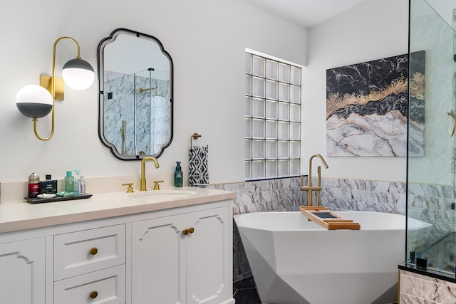 7884 Travlers Tree Dr, Boca Raton, FL 33433 - bathroom with tile walls, a freestanding tub, vanity, a shower, and wainscoting