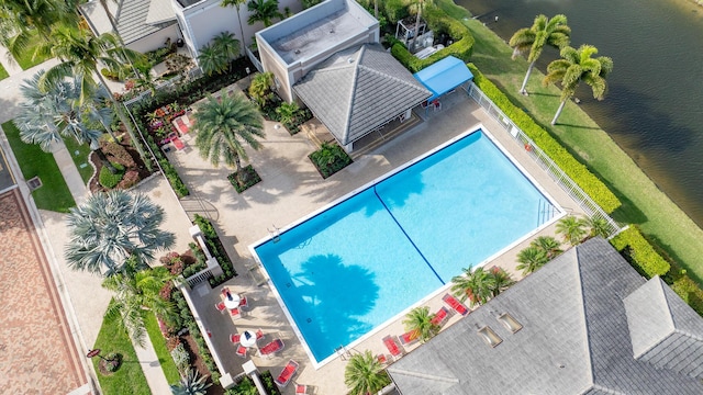 7884 Travlers Tree Dr, Boca Raton, FL 33433 - view of subject property featuring a pool and a nearby body of water
