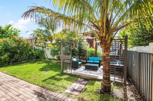 view of yard with an outdoor hangout area and a wooden deck