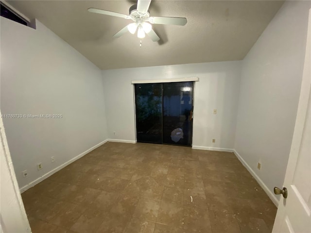 4393 Woodstock Dr Unit C, West Palm Beach, FL 33409 - spare room with ceiling fan, baseboards, and lofted ceiling