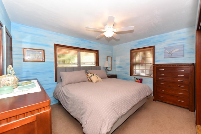 1116 NE Oceanview Cir, Jensen Beach, FL 34957 - bedroom featuring light colored carpet and a ceiling fan