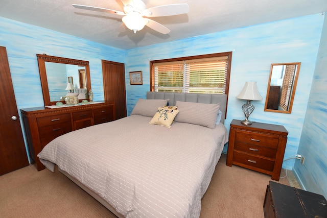 1116 NE Oceanview Cir, Jensen Beach, FL 34957 - bedroom featuring light carpet and a ceiling fan