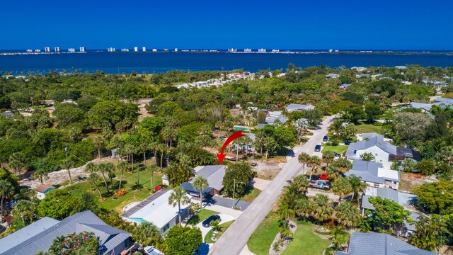 1116 NE Oceanview Cir, Jensen Beach, FL 34957 - aerial view of property's location with nearby suburban area and a nearby body of water