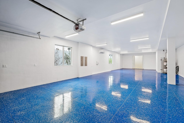 garage featuring a garage door opener, electric panel, gas water heater, and an indoor pool