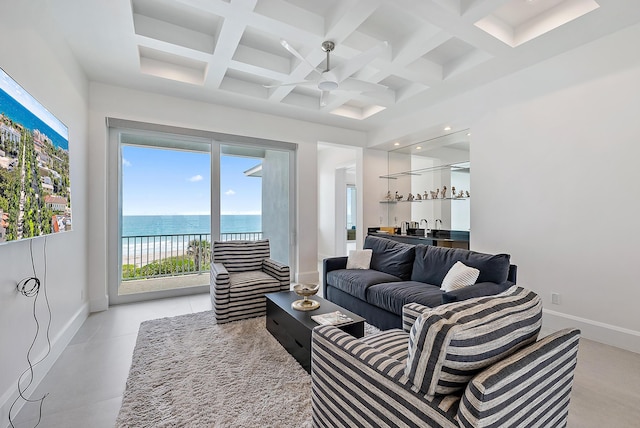living area with wet bar, baseboards, ceiling fan, beam ceiling, and coffered ceiling