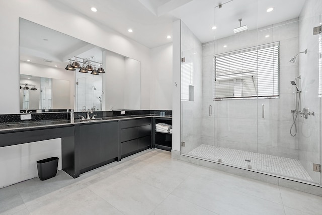bathroom with a stall shower, vanity, recessed lighting, and tile patterned flooring