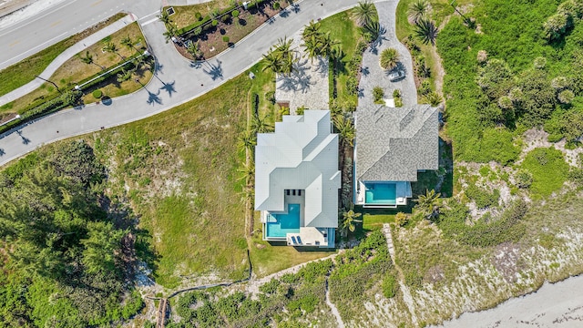 view of subject property featuring a pool area
