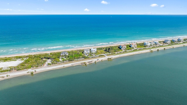 bird's eye view of waterfront with a beach