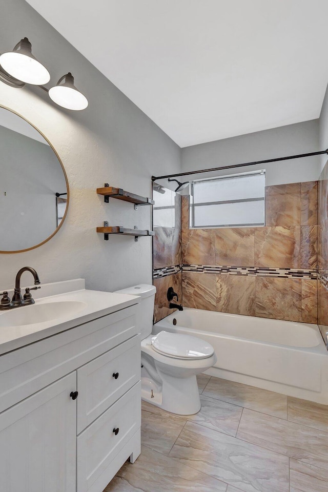1181 Larch Way, Wellington, FL 33414 - full bath featuring shower / tub combination, toilet, vanity, and marble look tile flooring