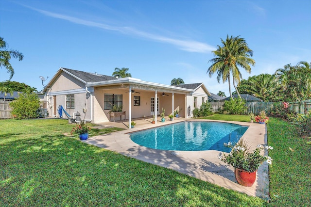 1181 Larch Way, Wellington, FL 33414 - back of property with a ceiling fan, a patio, and stucco siding