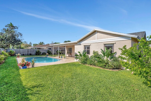 1181 Larch Way, Wellington, FL 33414 - rear view of property with a patio and stucco siding