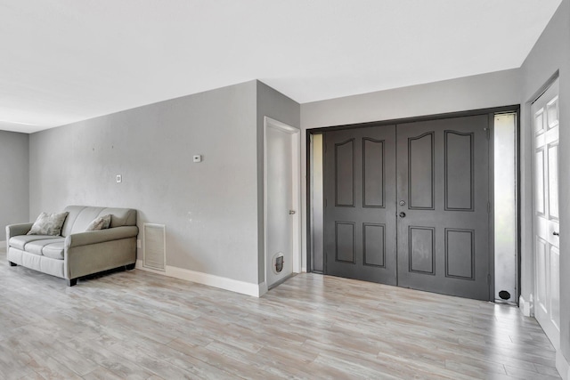 1181 Larch Way, Wellington, FL 33414 - entryway with light wood finished floors and baseboards