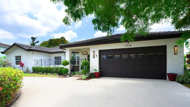 7340 Anadale Cir, Lake Worth, FL 33467 - single story home with driveway, a garage, and stucco siding