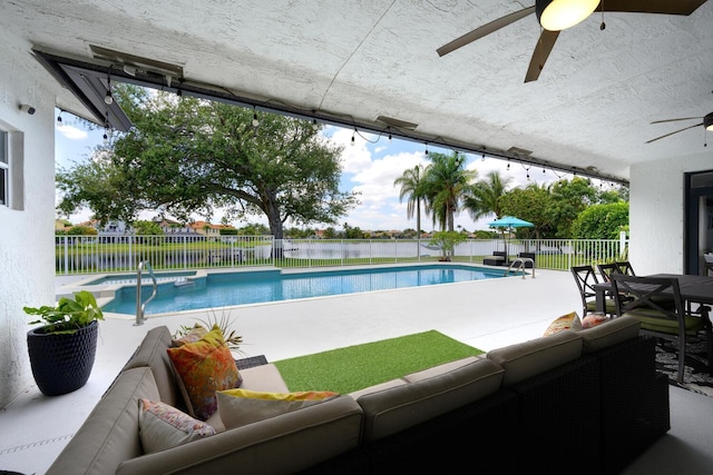 7340 Anadale Cir, Lake Worth, FL 33467 - view of pool with a ceiling fan, an outdoor living space, a fenced backyard, and a patio