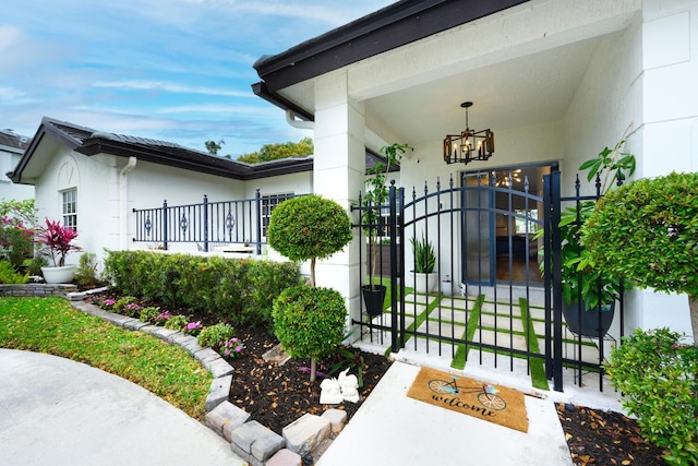 7340 Anadale Cir, Lake Worth, FL 33467 - doorway to property featuring a gate and stucco siding