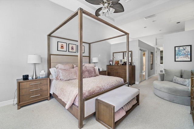 bedroom featuring light carpet and baseboards