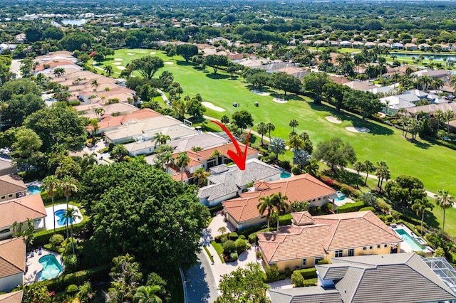 aerial perspective of suburban area with a golf club