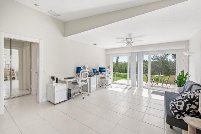 10853 SW Elsinore Dr, Port Saint Lucie, FL 34987 - office area featuring light tile patterned floors and a ceiling fan