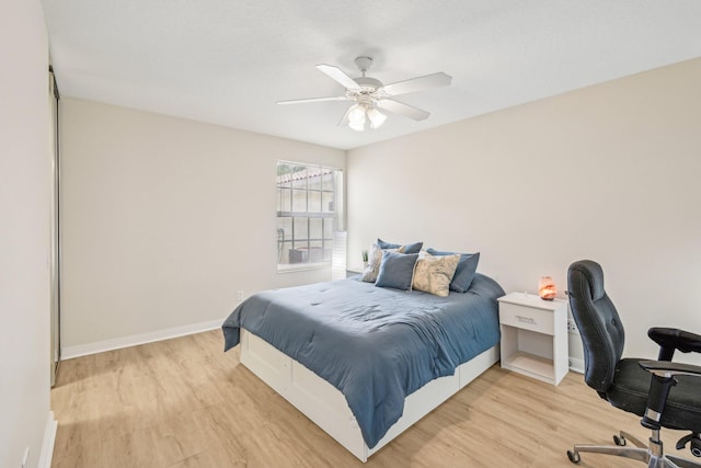 10853 SW Elsinore Dr, Port Saint Lucie, FL 34987 - bedroom featuring light wood finished floors, baseboards, ceiling fan, and an office area
