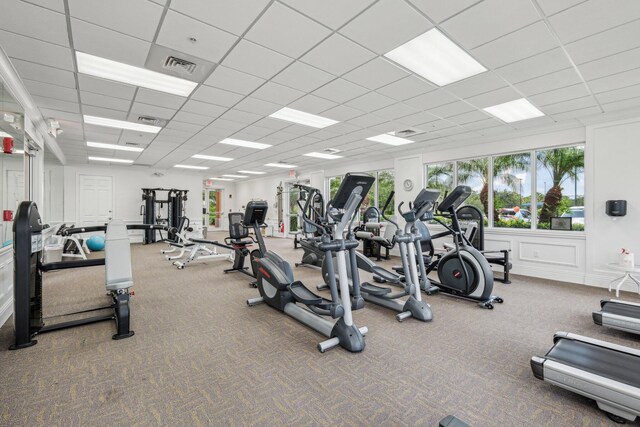 10853 SW Elsinore Dr, Port Saint Lucie, FL 34987 - workout area featuring carpet and a paneled ceiling
