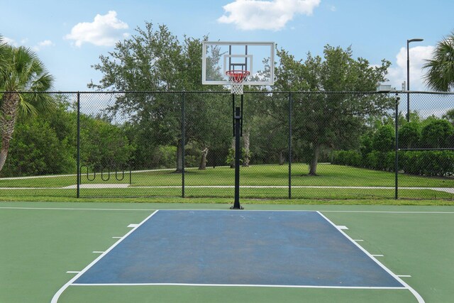 10853 SW Elsinore Dr, Port Saint Lucie, FL 34987 - view of sport court featuring community basketball court