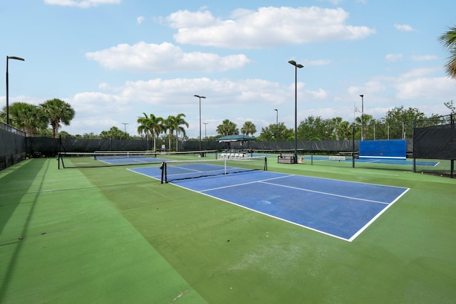 10853 SW Elsinore Dr, Port Saint Lucie, FL 34987 - view of tennis court featuring community basketball court