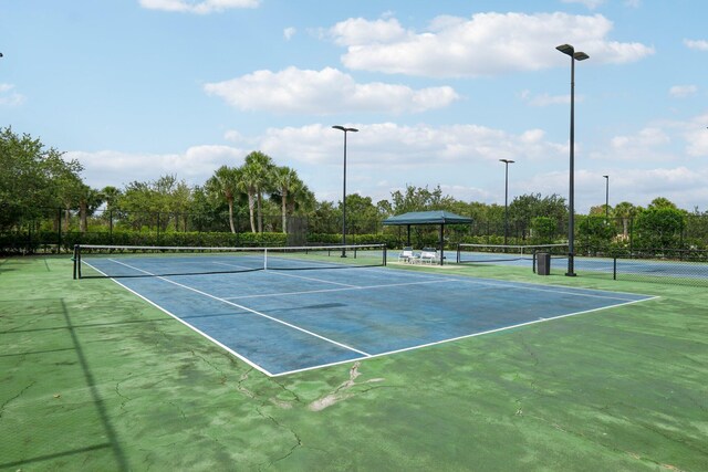 10853 SW Elsinore Dr, Port Saint Lucie, FL 34987 - view of tennis court with community basketball court