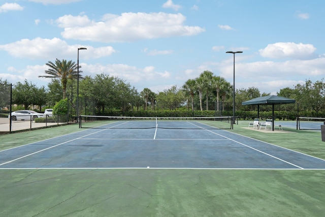 10853 SW Elsinore Dr, Port Saint Lucie, FL 34987 - view of tennis court with community basketball court