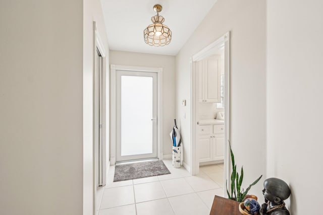 10853 SW Elsinore Dr, Port Saint Lucie, FL 34987 - doorway with light tile patterned floors