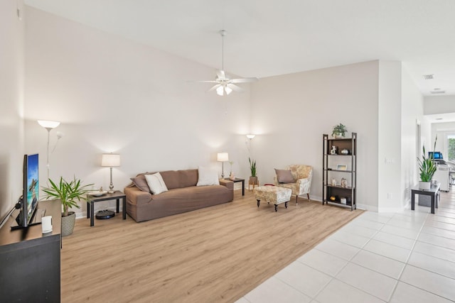 10853 SW Elsinore Dr, Port Saint Lucie, FL 34987 - living room with ceiling fan, baseboards, and light wood-style floors