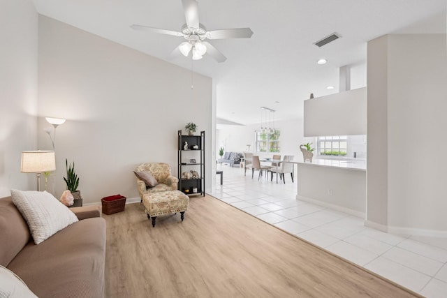 10853 SW Elsinore Dr, Port Saint Lucie, FL 34987 - living room with light wood-type flooring, a ceiling fan, baseboards, and recessed lighting