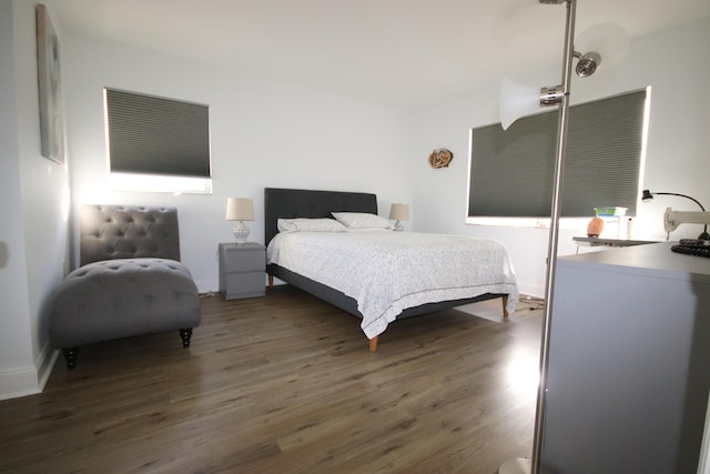 9842 Marina Blvd Unit 711, Boca Raton, FL 33428 - bedroom with dark wood finished floors and baseboards