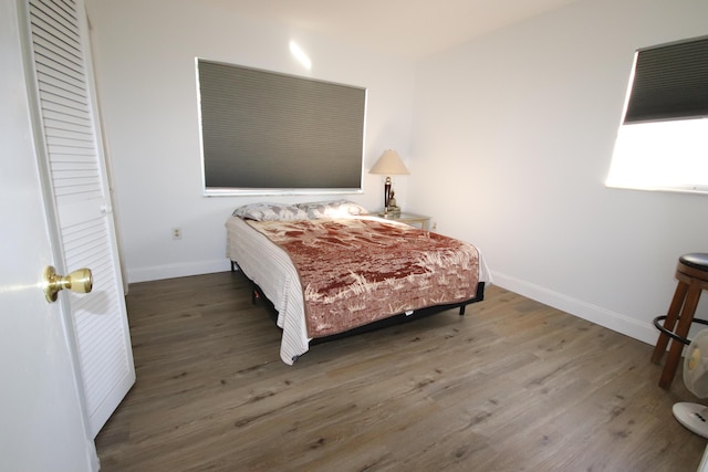 9842 Marina Blvd Unit 711, Boca Raton, FL 33428 - bedroom with wood finished floors and baseboards