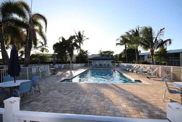 9842 Marina Blvd Unit 711, Boca Raton, FL 33428 - community pool with a patio and fence