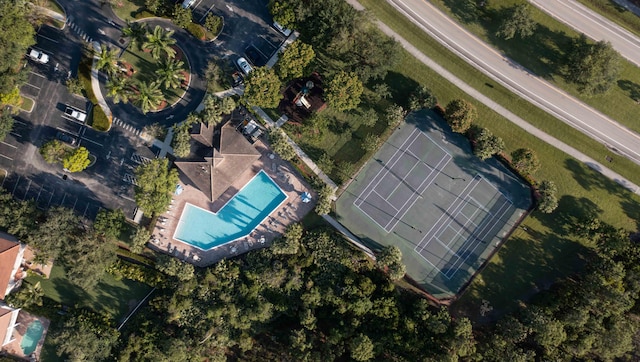 aerial view of property's location featuring a pool