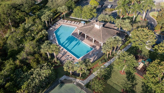 view of property location with a pool