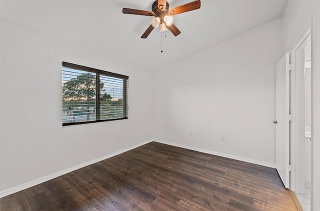 unfurnished bedroom featuring wood finished floors, baseboards, and ceiling fan