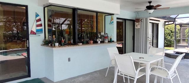1132 SE Oriental Ave, Port Saint Lucie, FL 34952 - view of patio featuring a ceiling fan and a lanai