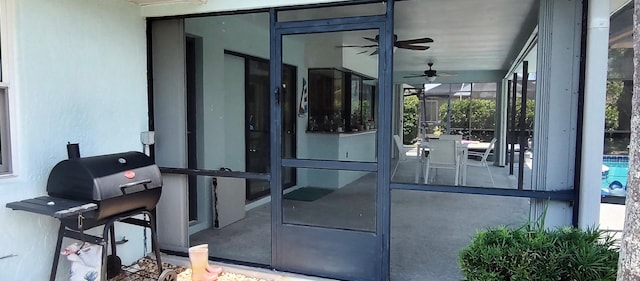 1132 SE Oriental Ave, Port Saint Lucie, FL 34952 - view of patio with a sunroom, grilling area, and ceiling fan