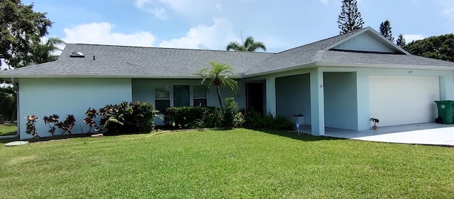 1132 SE Oriental Ave, Port Saint Lucie, FL 34952 - view of front of home with an attached garage, a front lawn, roof with shingles, stucco siding, and concrete driveway