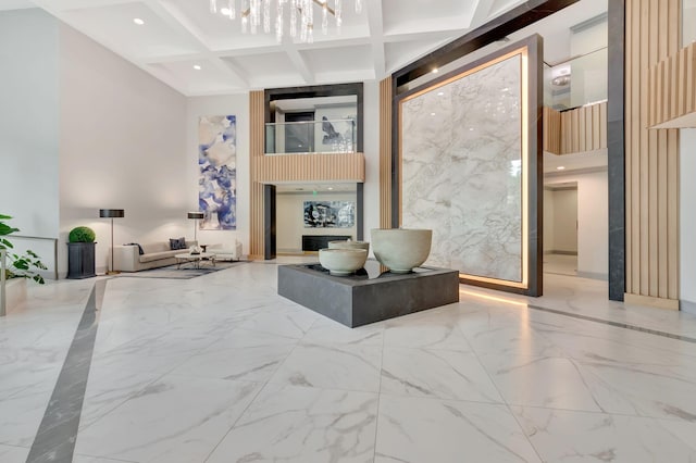 500 SE Mizner Blvd Unit A202, Boca Raton, FL 33432 - community lobby with a towering ceiling, coffered ceiling, and beam ceiling
