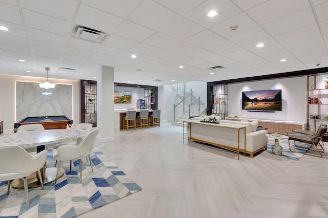 500 SE Mizner Blvd Unit A202, Boca Raton, FL 33432 - living room with pool table, stairs, a drop ceiling, baseboards, and recessed lighting