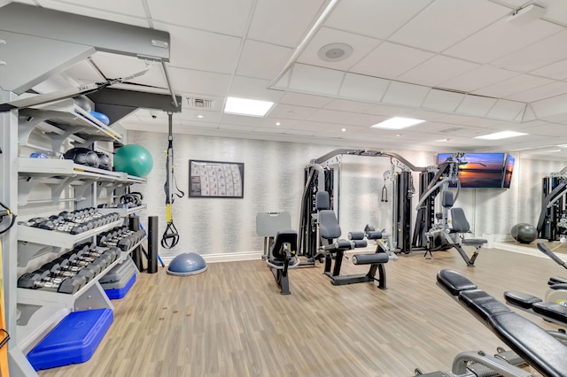 500 SE Mizner Blvd Unit A202, Boca Raton, FL 33432 - workout area with baseboards, wood finished floors, a paneled ceiling, and wallpapered walls