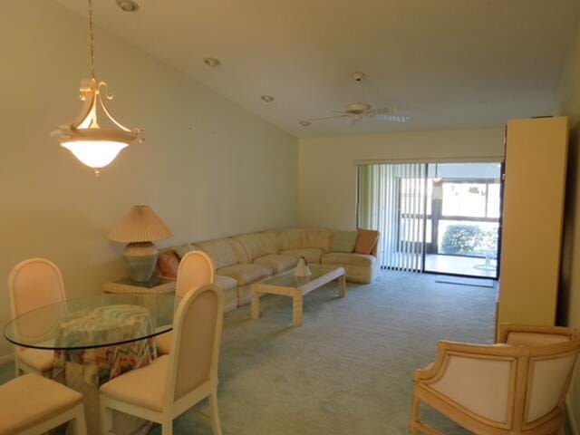 816 Sky Pine Way Unit H, Greenacres, FL 33415 - carpeted living area with a ceiling fan