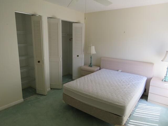 816 Sky Pine Way Unit H, Greenacres, FL 33415 - carpeted bedroom featuring baseboards and a ceiling fan