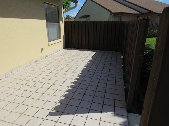 816 Sky Pine Way Unit H, Greenacres, FL 33415 - view of patio / terrace featuring fence