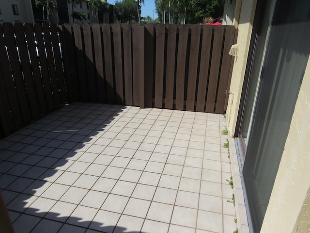 816 Sky Pine Way Unit H, Greenacres, FL 33415 - view of patio featuring fence