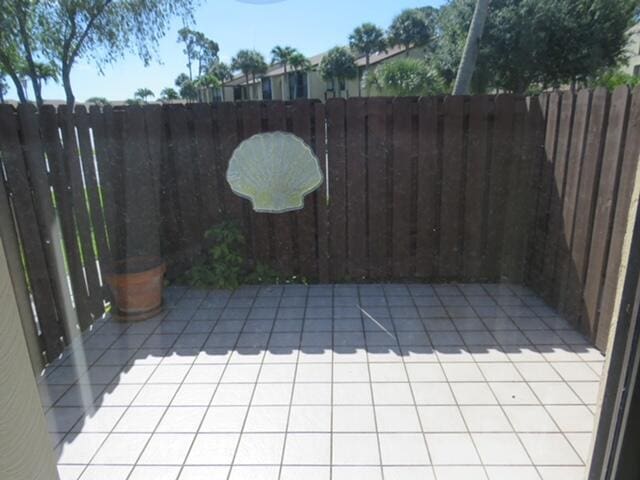 816 Sky Pine Way Unit H, Greenacres, FL 33415 - view of patio with fence